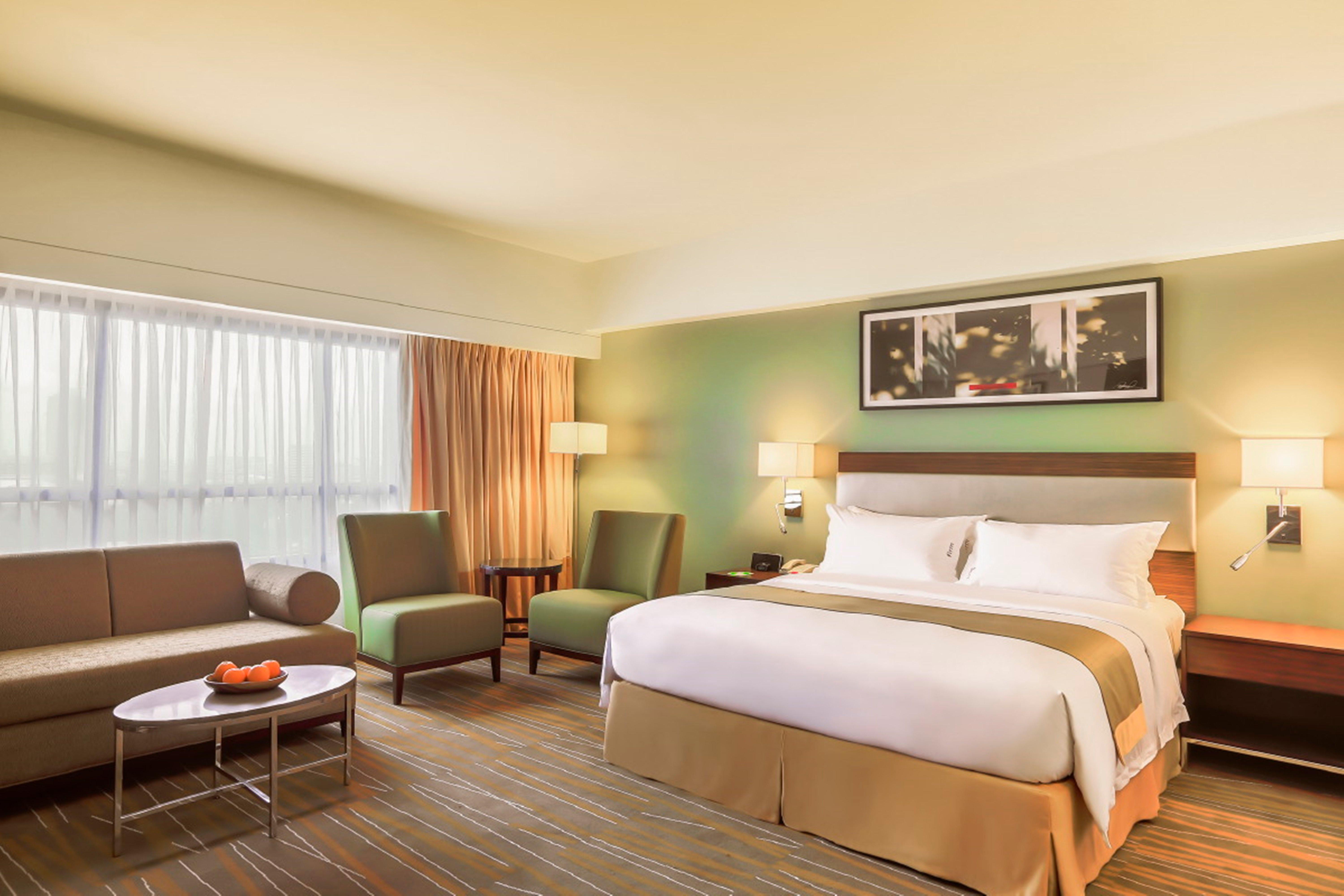 Holiday Inn & Suites Makati By Ihg Makati City Exteriér fotografie A typical room at the Holiday Inn